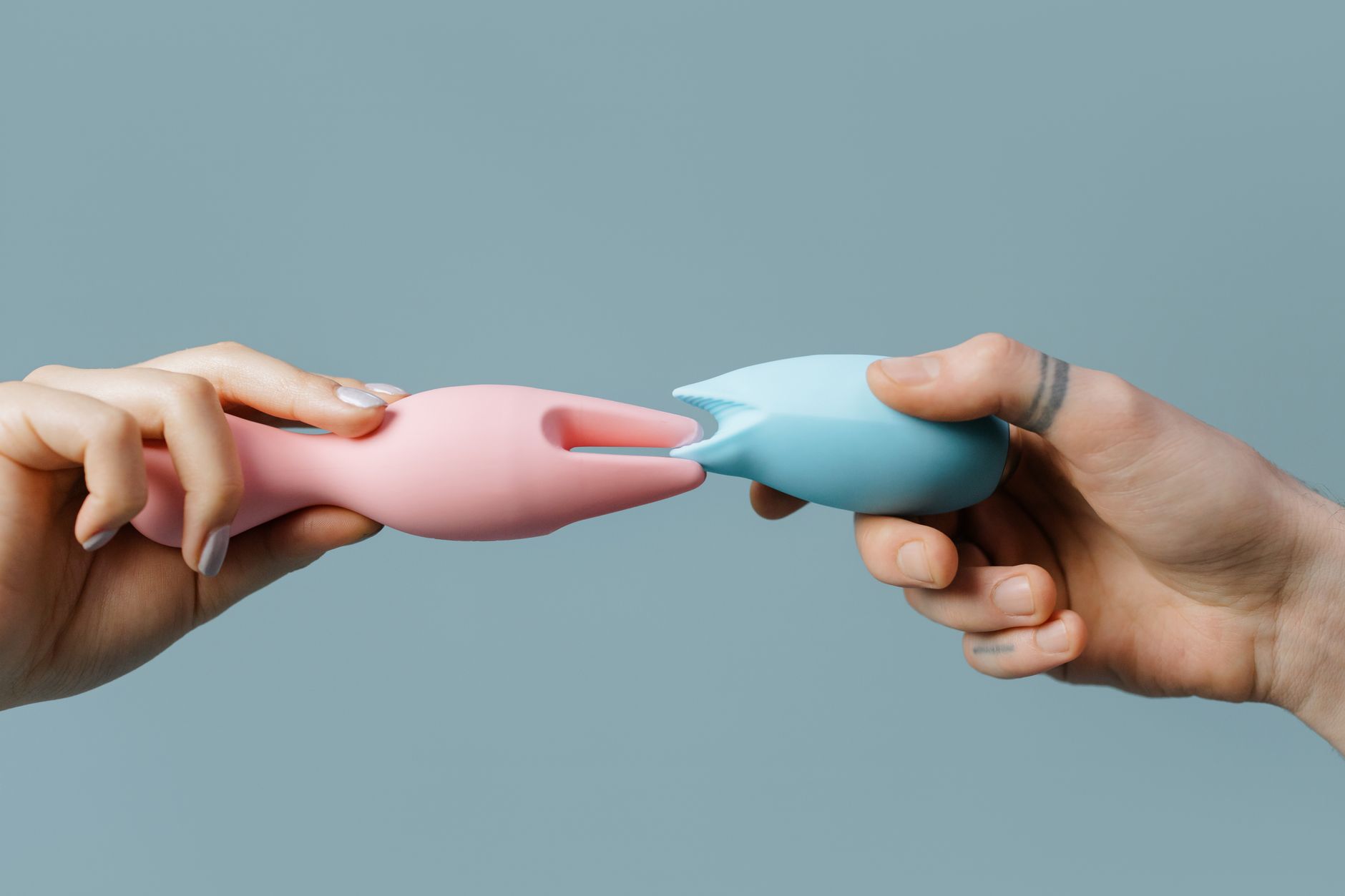 Woman holding lemon vibrators, ready to explore with confidence